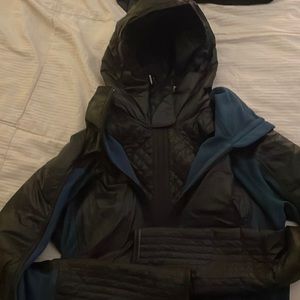 Black and teal Lululemon jacket